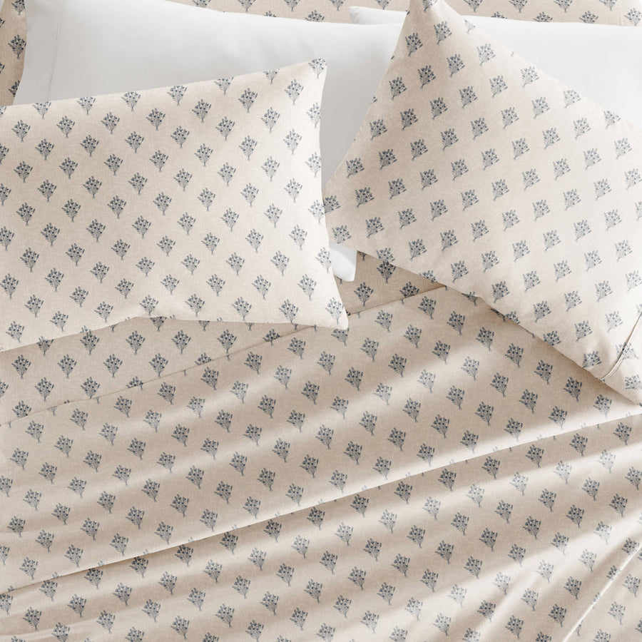 Patterned bed sheets and pillowcases on a neutral background